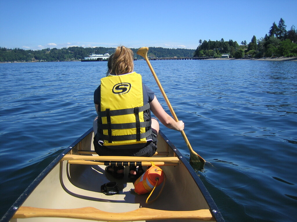 onehanded paddle trying to help while taking a call will.d Flickr