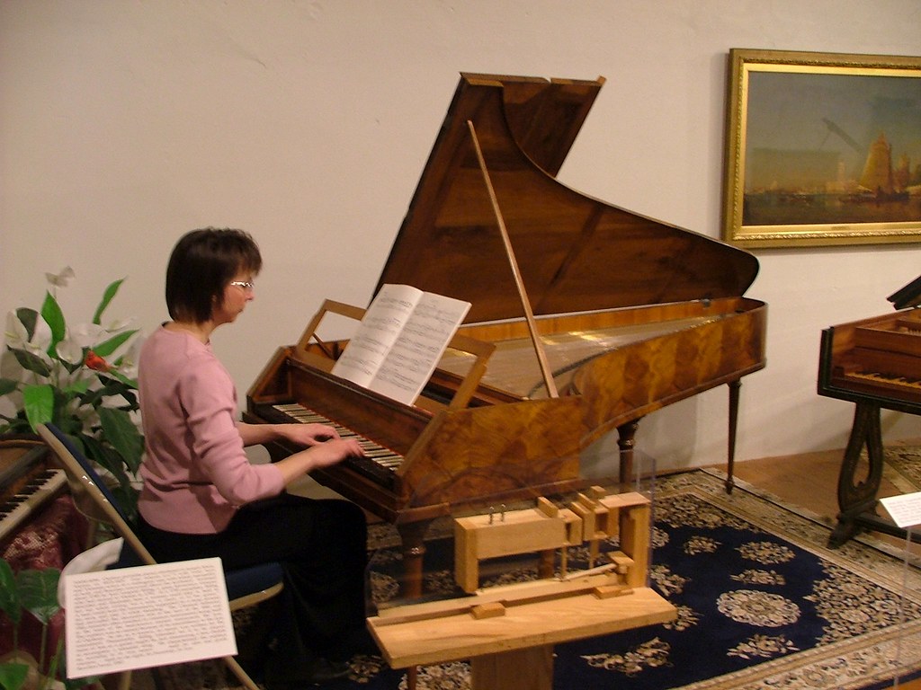 Playing the harpsichord A volunteer played on the harpsich… Flickr