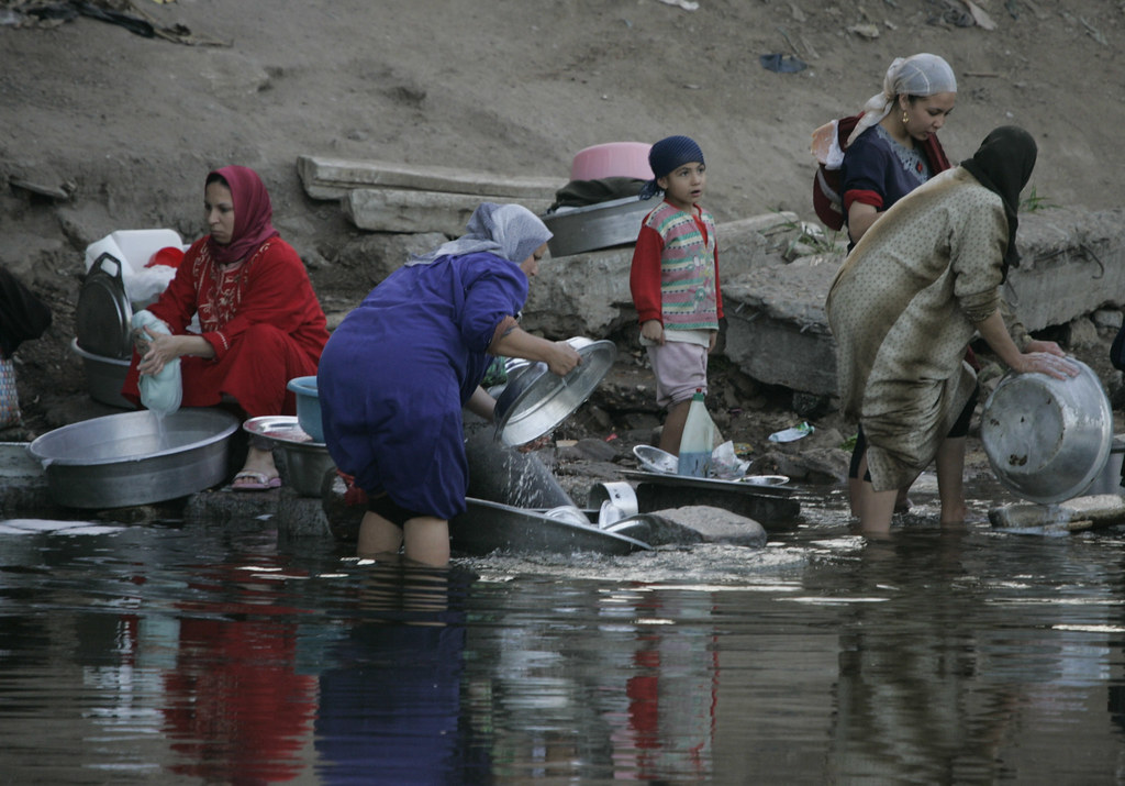 EGYPT Egyptian's woman washes clothes on pollution Canal a… Flickr