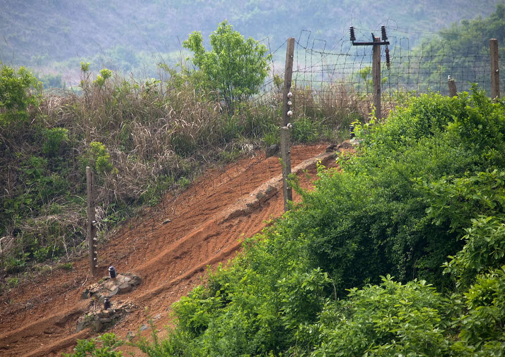 Electric fence on the DMZ, north korean side North Korea… Flickr
