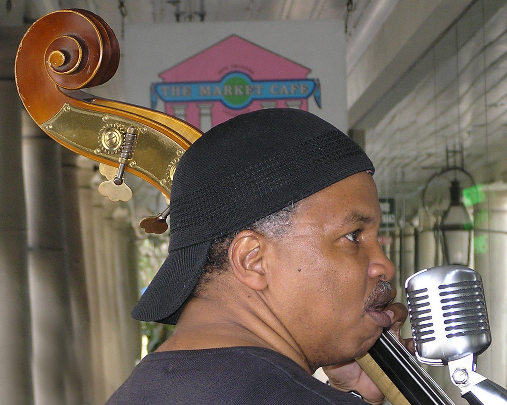 musician bass cafe, French Market area, New Orleans, Louis… Flickr
