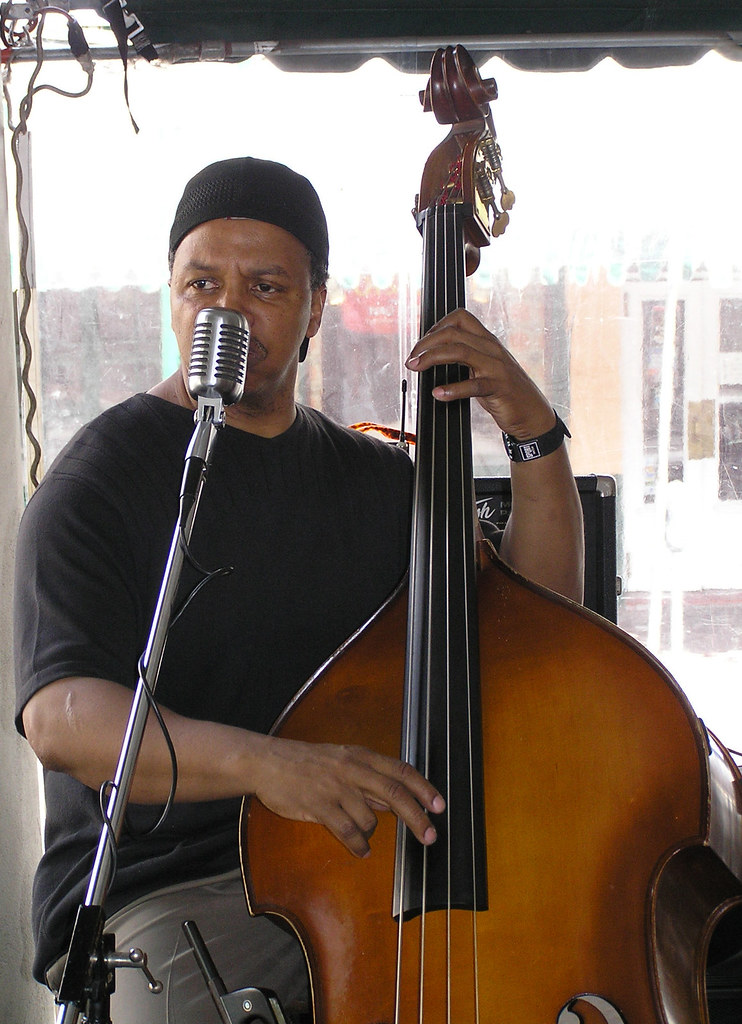 musician bass cafe, French Market area, New Orleans, Louis… Flickr