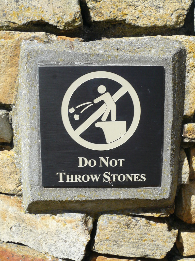 Do Not Throw Stones This sign was at the top of a cliff ab… Flickr
