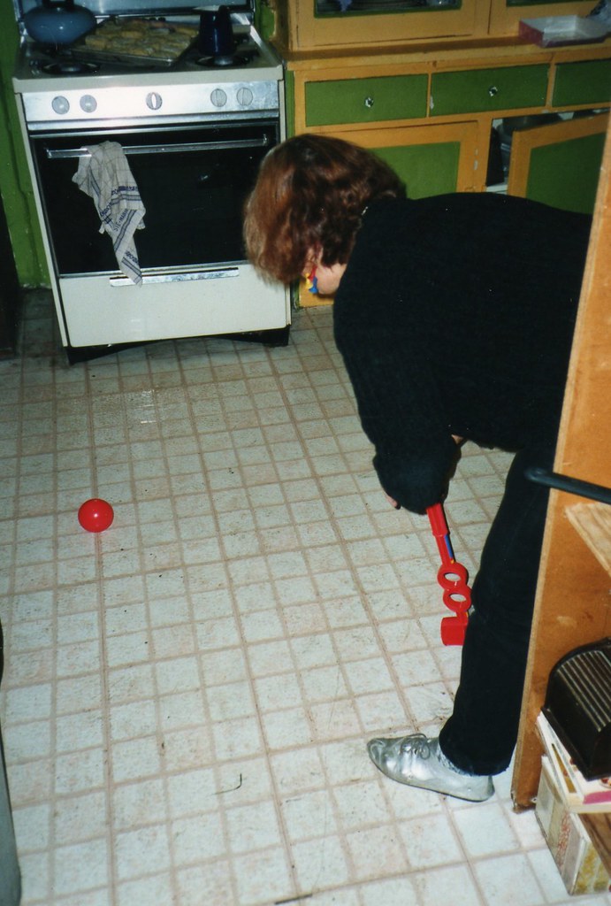 Nancy Phelps plays kitchen croquet or something like that Flickr