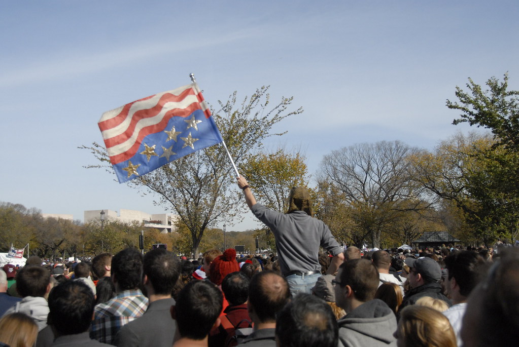 Flag Waver Flag waver on the National Mall at the Rally To… Flickr