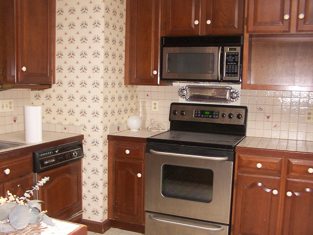 Kitchen Flat top electric stove and microwave, and dishwas… Flickr