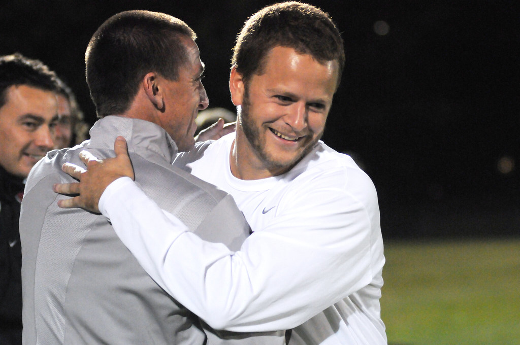 Elon v Radford 1 Senior Stephen Dilger receives a hug from… Flickr