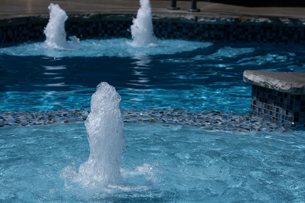 Swim World Pools Extreme Fiberglass Pool with swimin tanning Ledge a