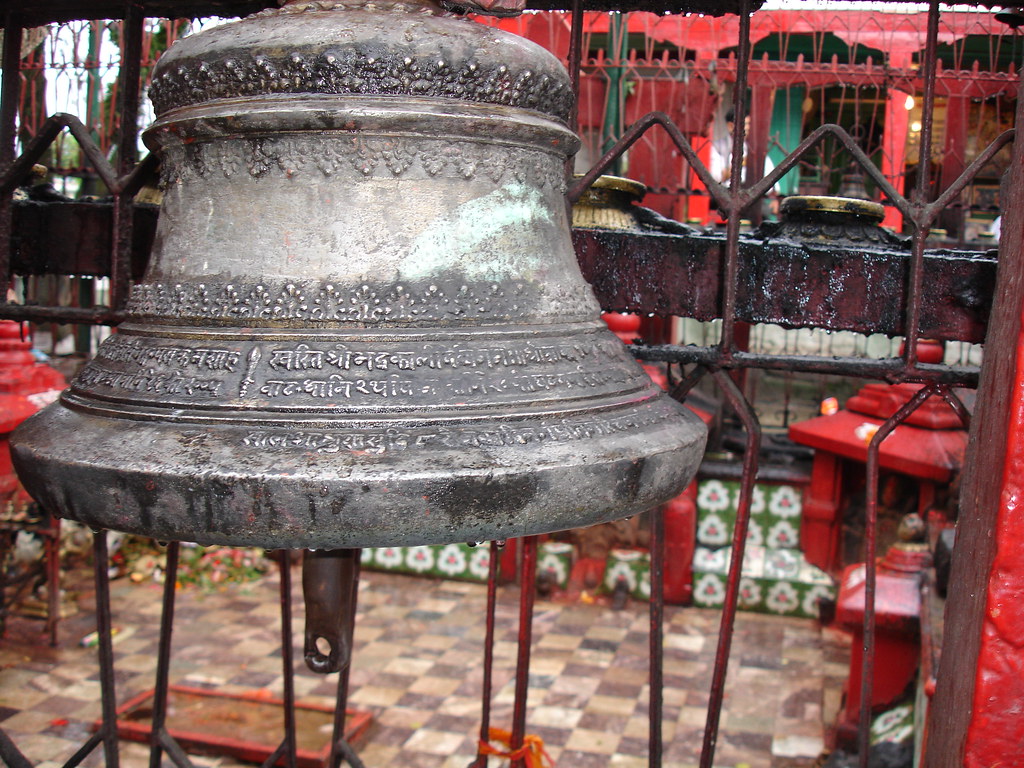 A temple bell It just doesn't stop ringing... Saroj Regmi Flickr