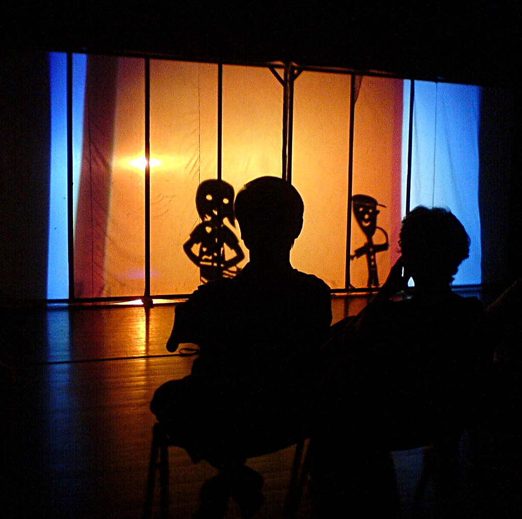 watching the shadow puppets Watching a shadow puppet show Flickr