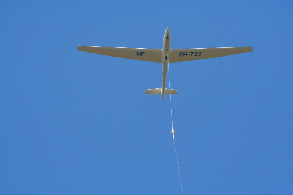 Glider The glider is pulled into the air to start its flig… Flickr