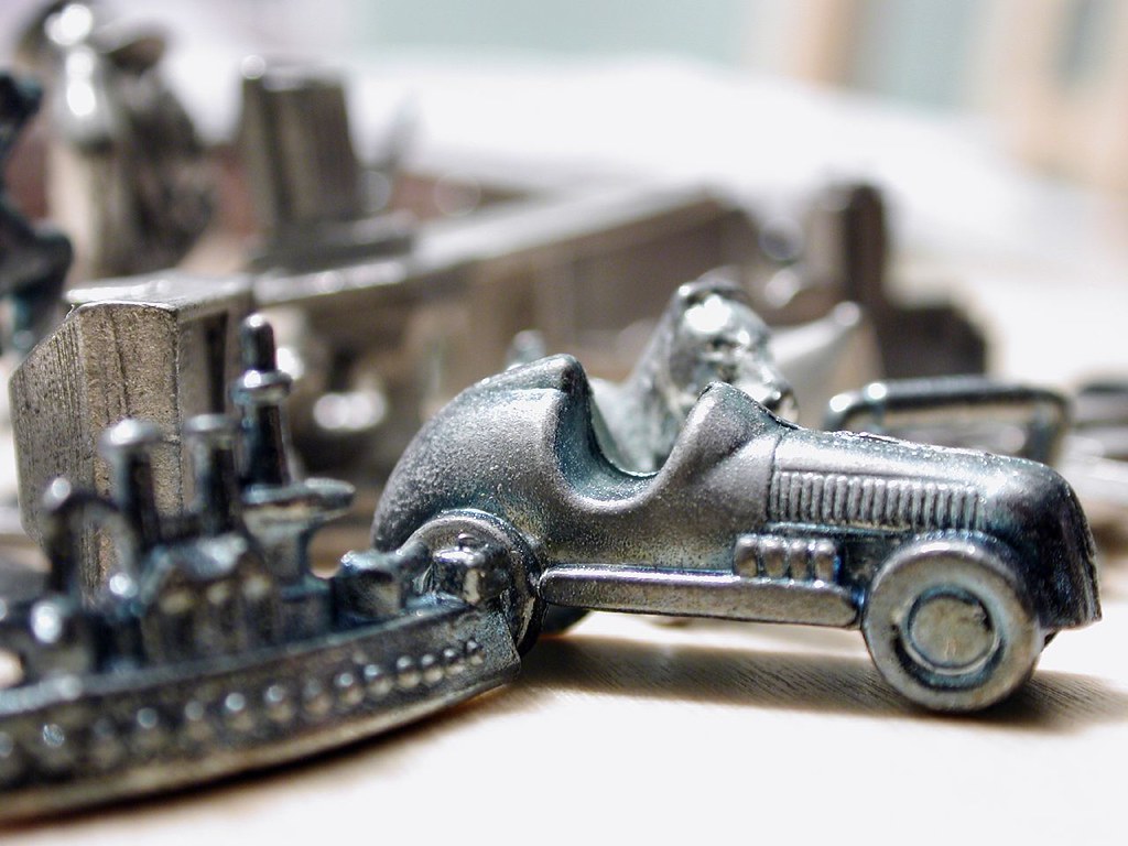 Monopoly Pieces, old and new A collection of monopoly play… Flickr