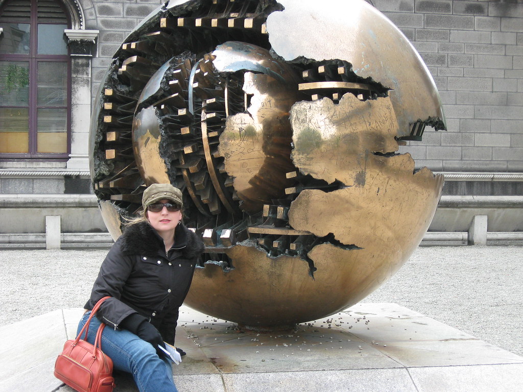 Zoe LUVS sculpture Zoe in front of an orb at Trinity Colle… zee dot