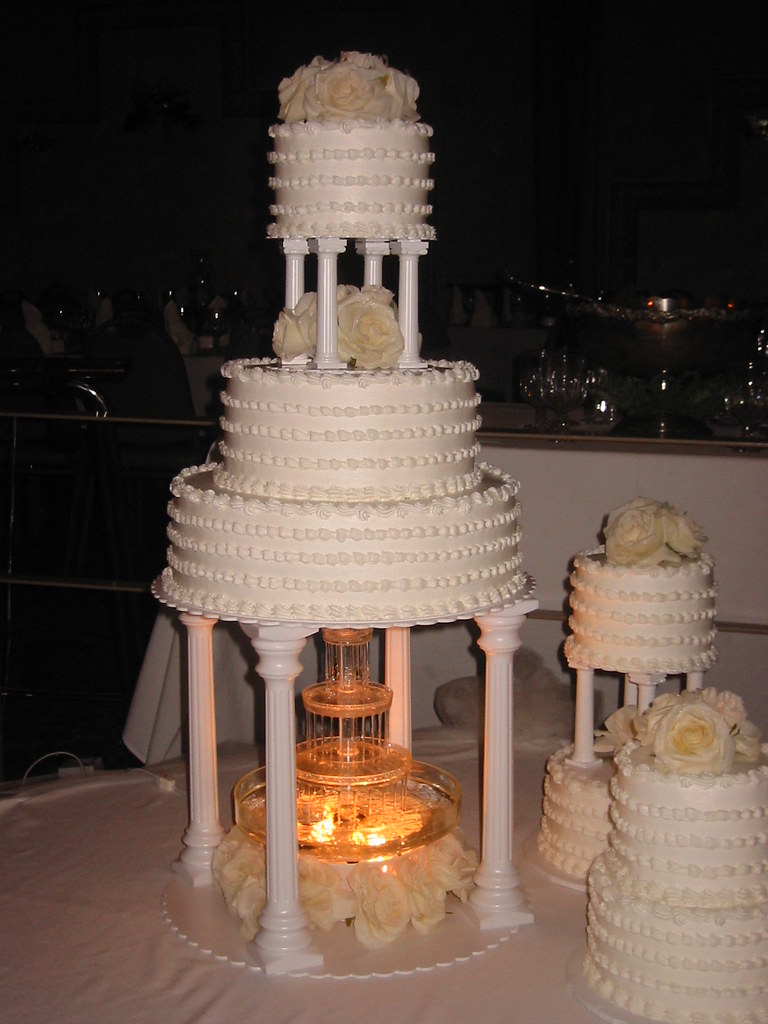 Wedding cake with fountain cake idea from Wilton year book… Flickr