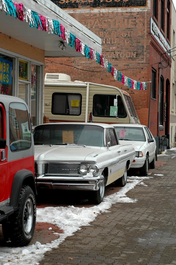 Farmer Jones Carz' This very funky used car lot has been a… Flickr