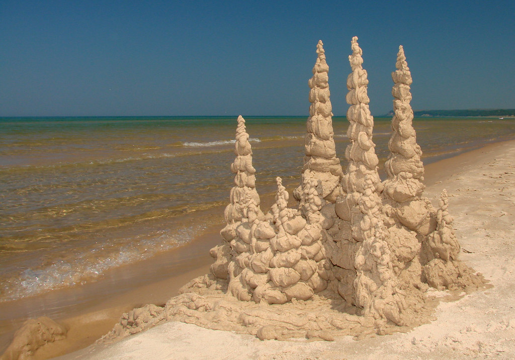 Beach Magic Sand castle on the beach at Pentwater Michigan… Steve