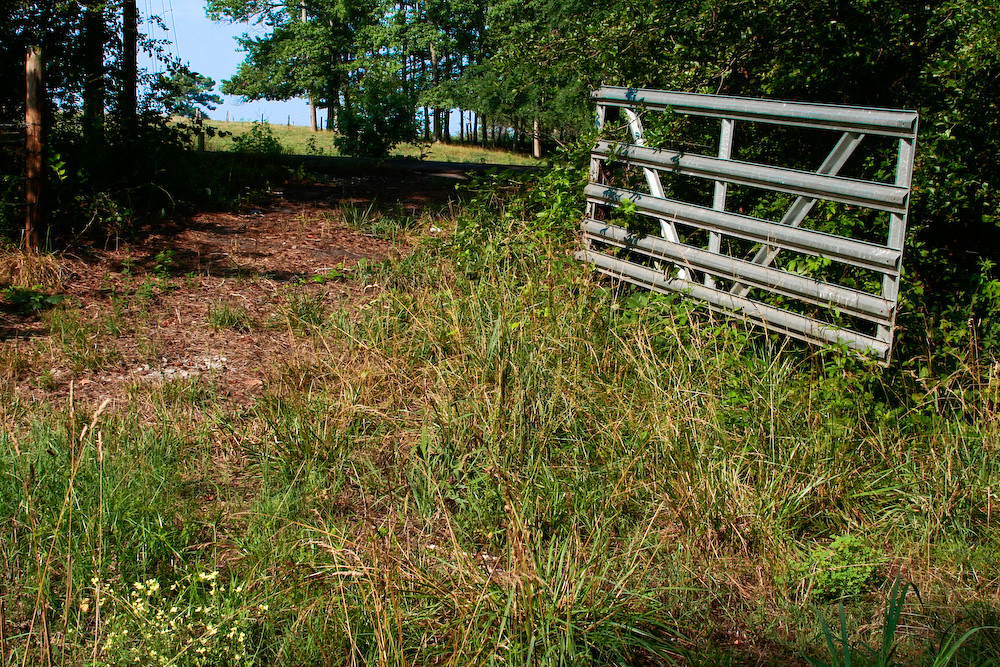 Gate Open gate down in the pasture. Justin Davis Flickr