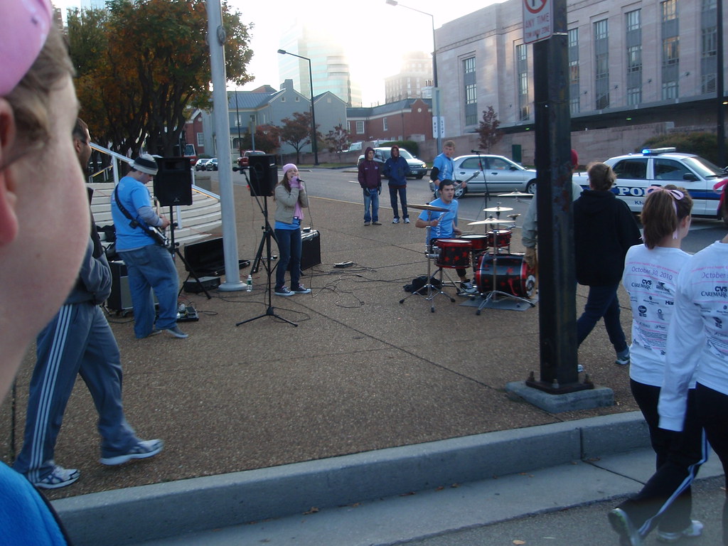 corner band One of several bands playing along the route. Joel