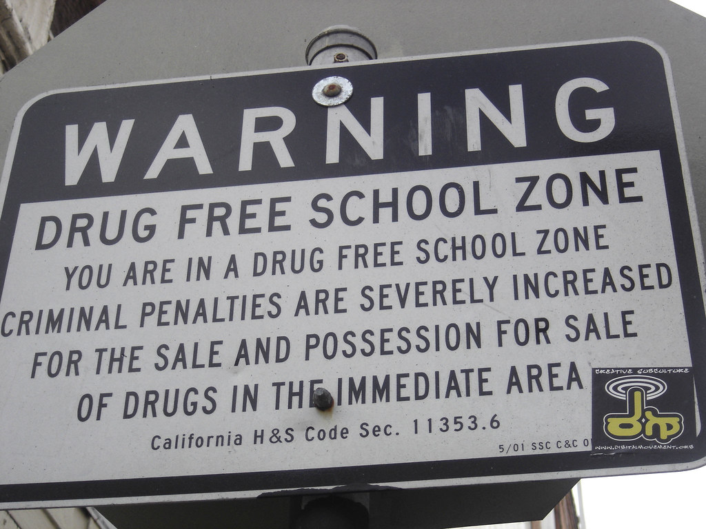 THIS IS A DRUG FREE ZONE Uh, I don't think so. This sign h… Flickr