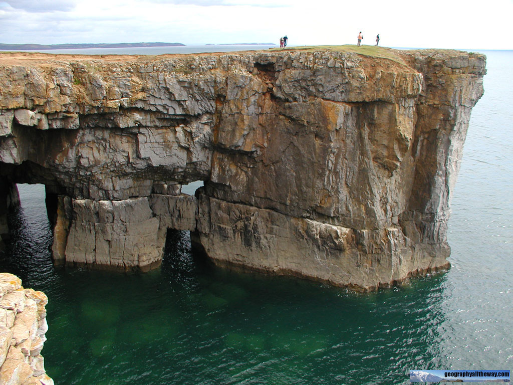 Coastal Landform Headland and Arch. Pembroke, South Wales, UK a