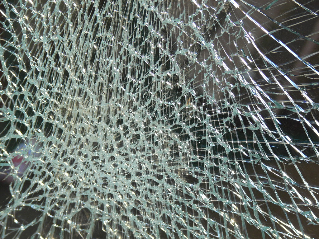 shatter toughened glass on vandalised bus shelter Zelda Richardson