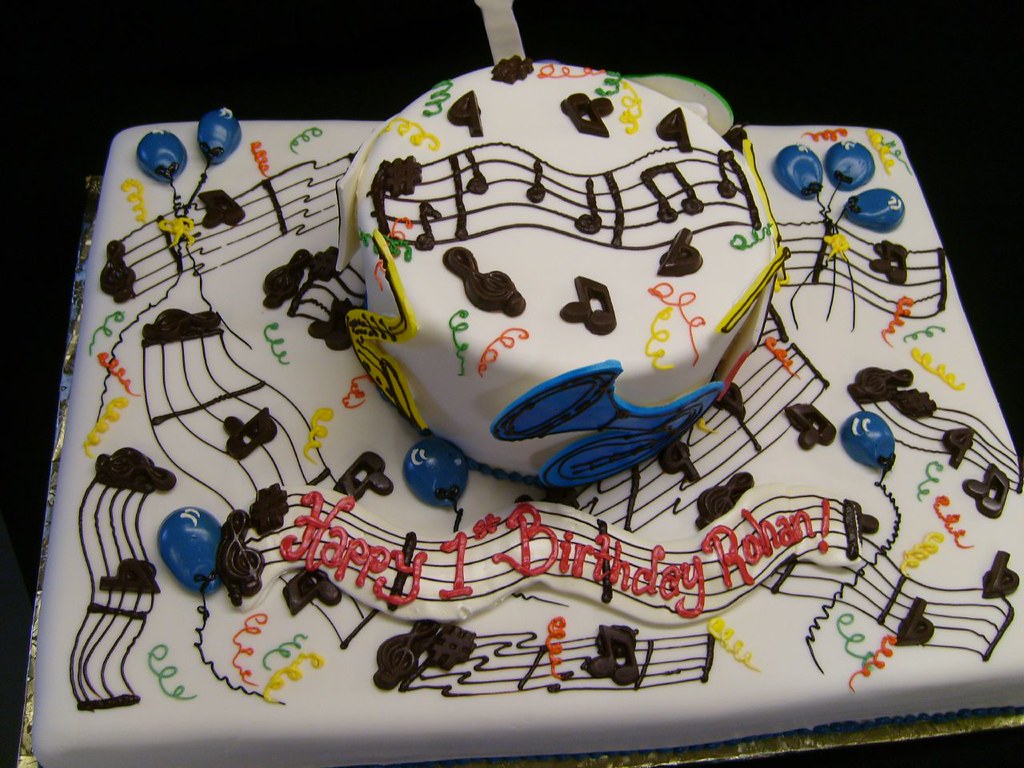 A musicthemed cake with chocolate music notes and cutout… Flickr