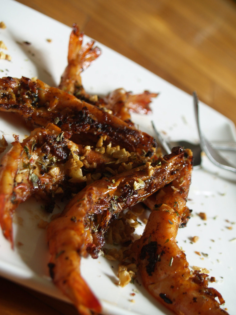 Grilled prawns with herb butter, flamed in white wine with… Flickr