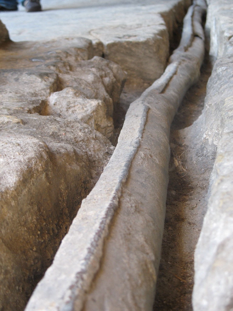 roman lead pipe It originally fed the great bath, but now … Flickr