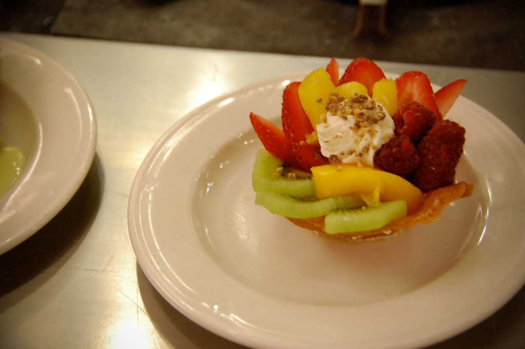 plated desserts mixed fruit, whipped cream in a tuille regan wright