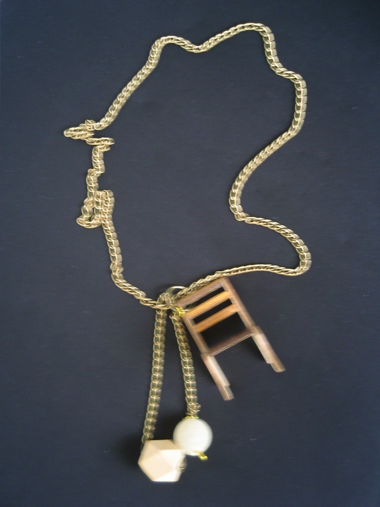 my "silya" necklace love the chair charm on the necklace Yvette
