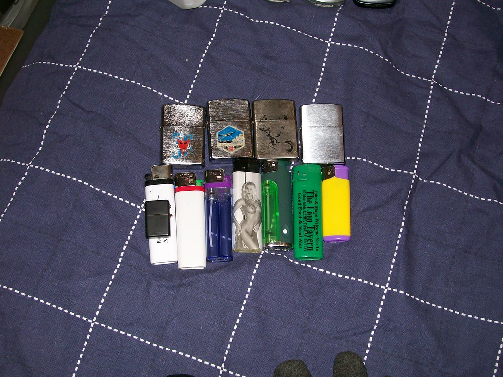 My lighters Lots of lighters. I dunno if you can see it, b… Flickr