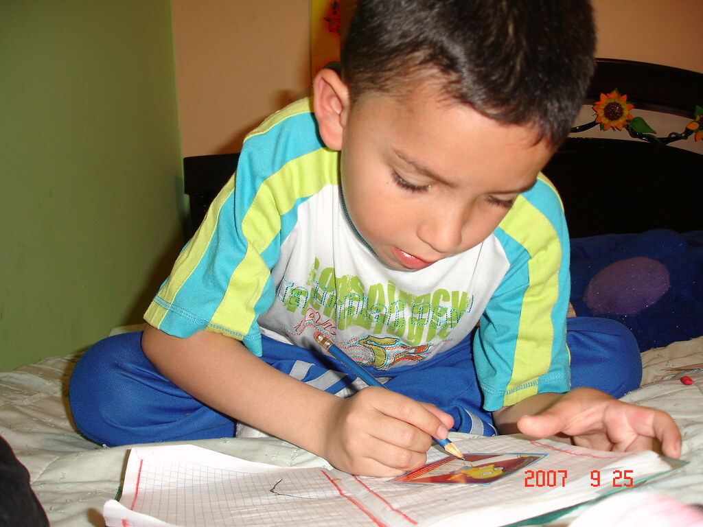 QUE JUICIOSO! Él es Víctor Camilo, hijo de mi sobrina Glad… Flickr