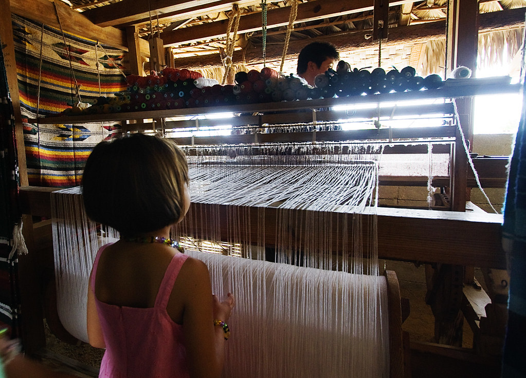 the blanket factory A young girl watches blankets being ma… Flickr