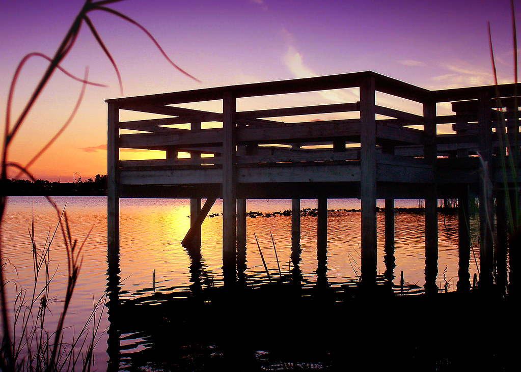 Sunset on Lake Fredrica A colorful sunset behind the dock … Flickr