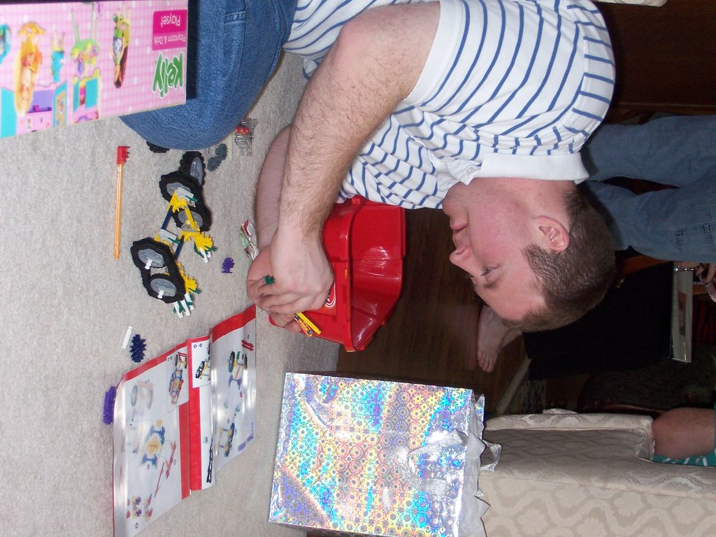 100_3590 Joe, playing with Trevor's toys. Jessica Drager Flickr