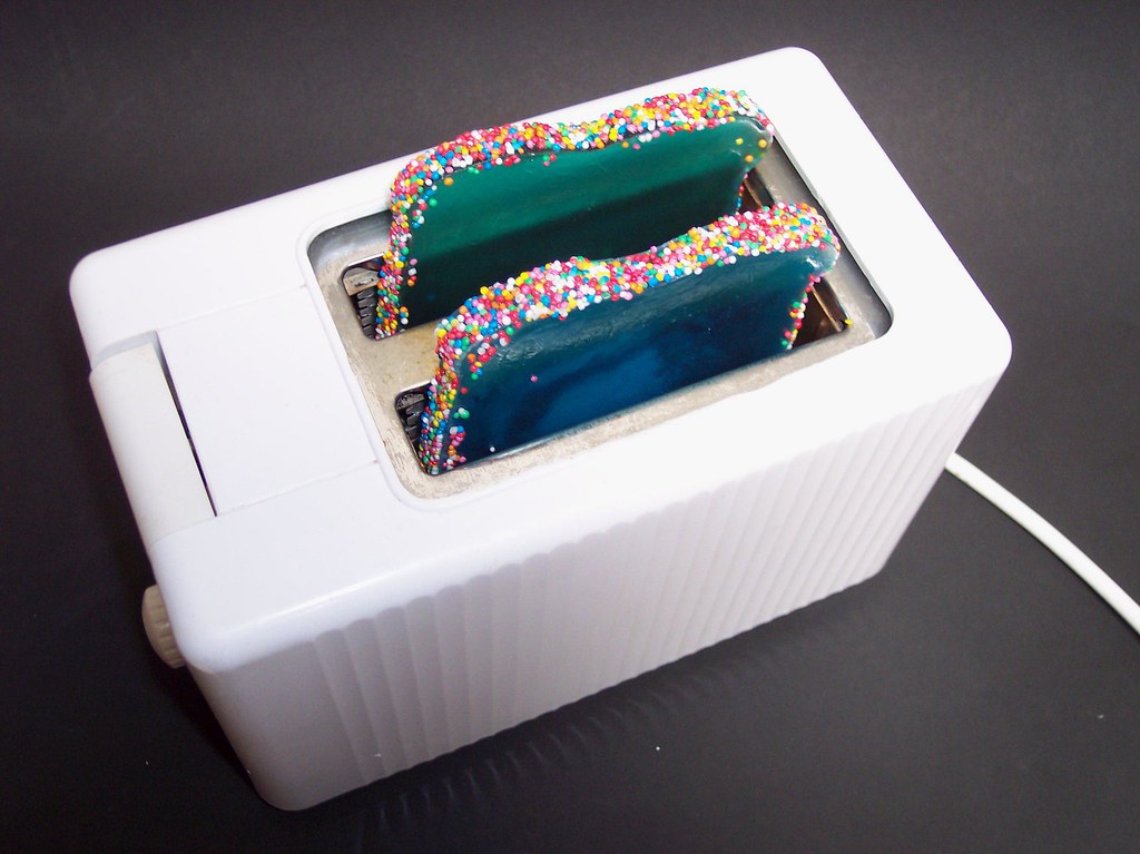 Toaster I made the toast with a metal mold a very long f… Flickr