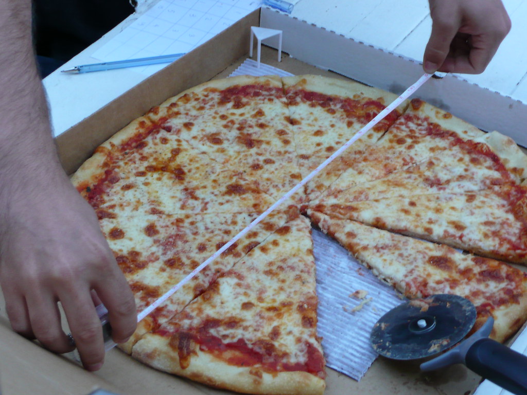 Measuring Pizza a GoGo The largest pizza so far! Flickr