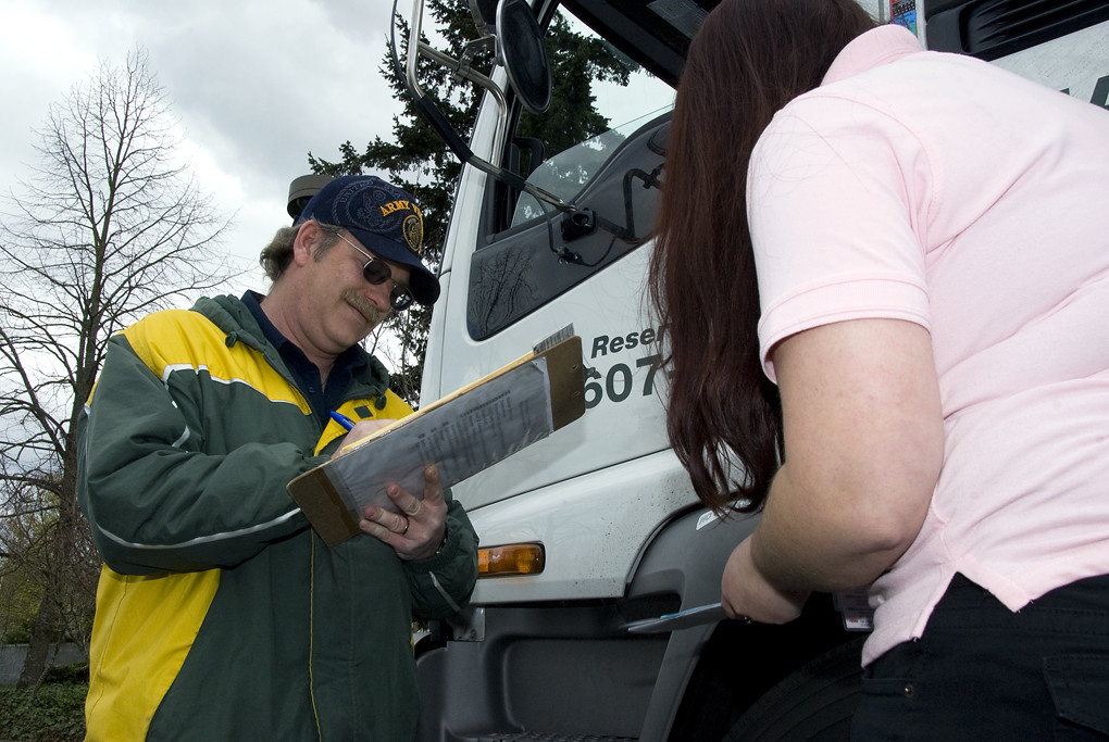 Vehicle Inspection A DMV representative goes over a pretr… Flickr