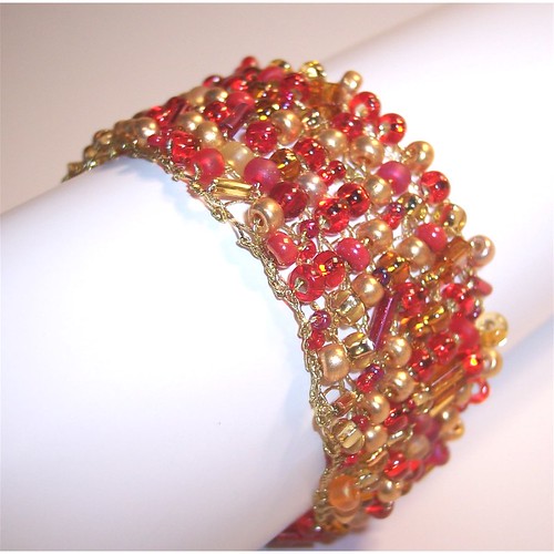 red and gold bracelet Knit bracelet with opaque and transp… Flickr