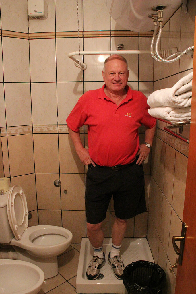 JdP tries out the curtainless shower in Tirana Hotel Flickr