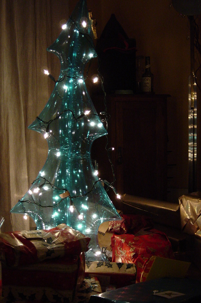 Fake plastic tree ..but real presents. Christmas 2006 Maggie
