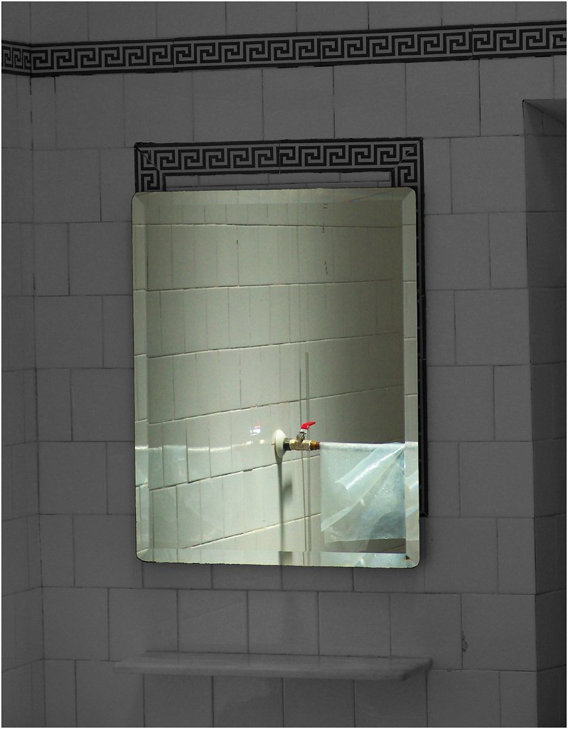 The tap in the mirror A tap is a tap is tap. Flickr