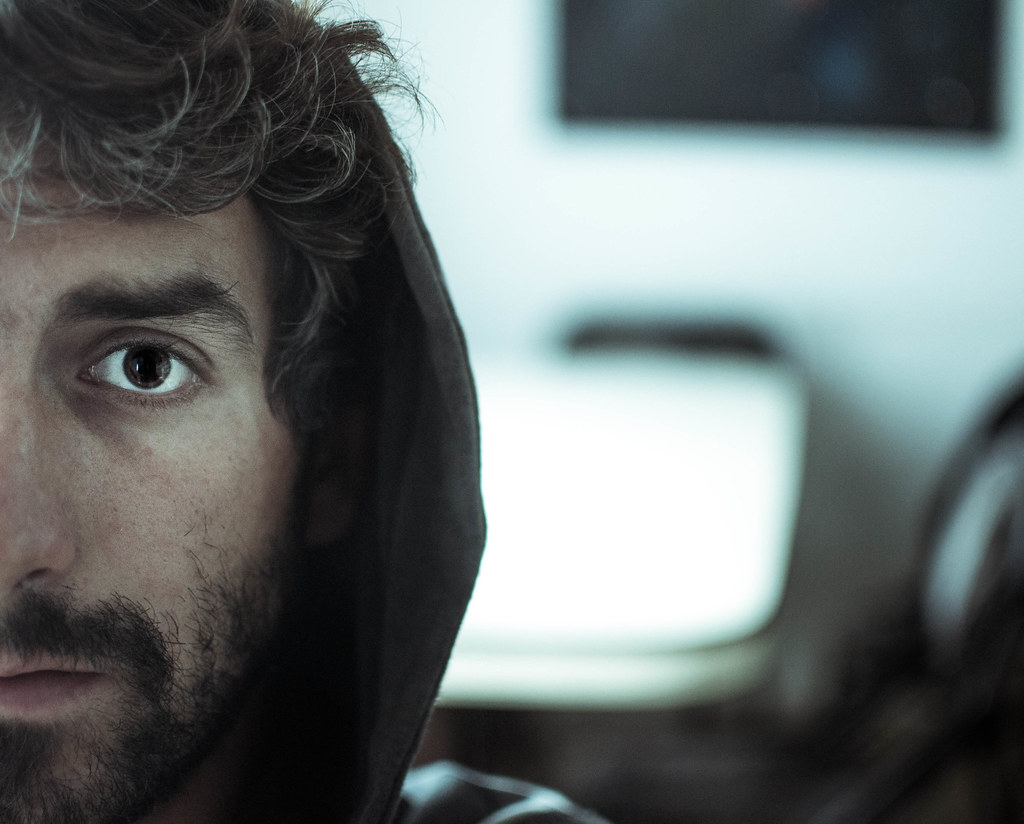 Everything is blue, his pills, his hands, his jeans. Flickr