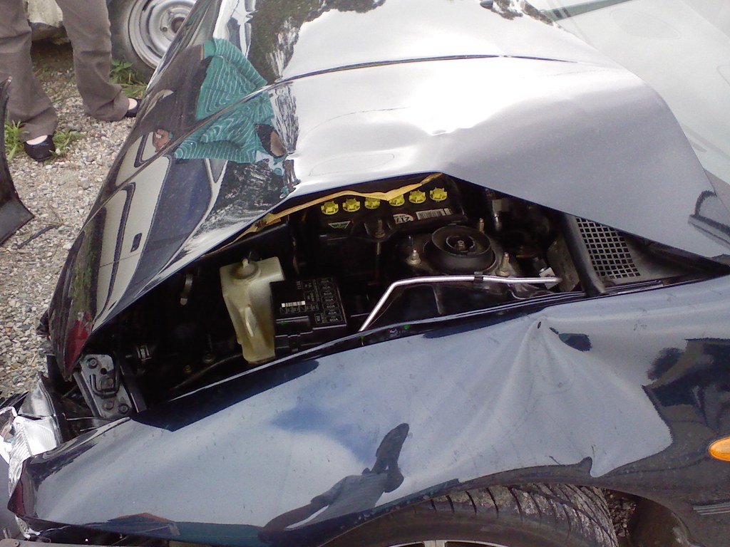 Bent Ass Hood The hood is bent right up from the impact. C… Flickr