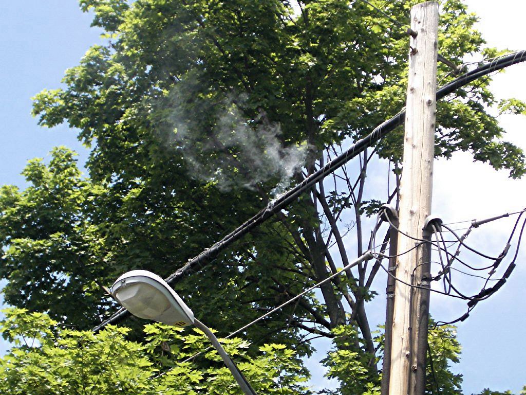 Power Line Smoking A sparking and smoking power line on Dr… Flickr