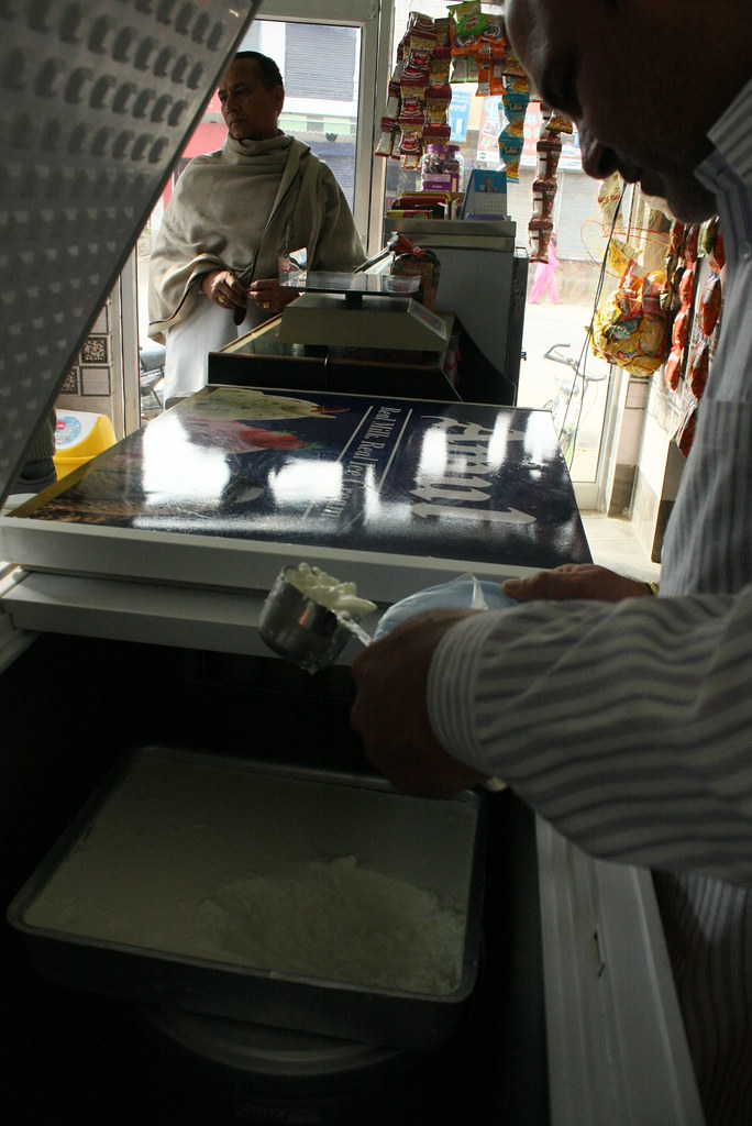 Dairy shop owner Balinder Kumar with a customer Visit to S… Flickr