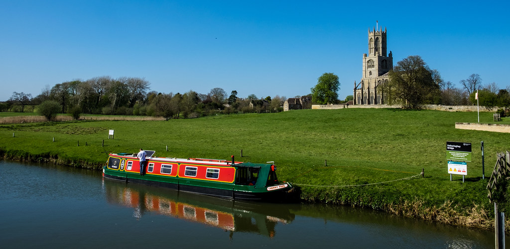 Moored A narrow boat on the River Nene at Fotheringhay Peter Leigh