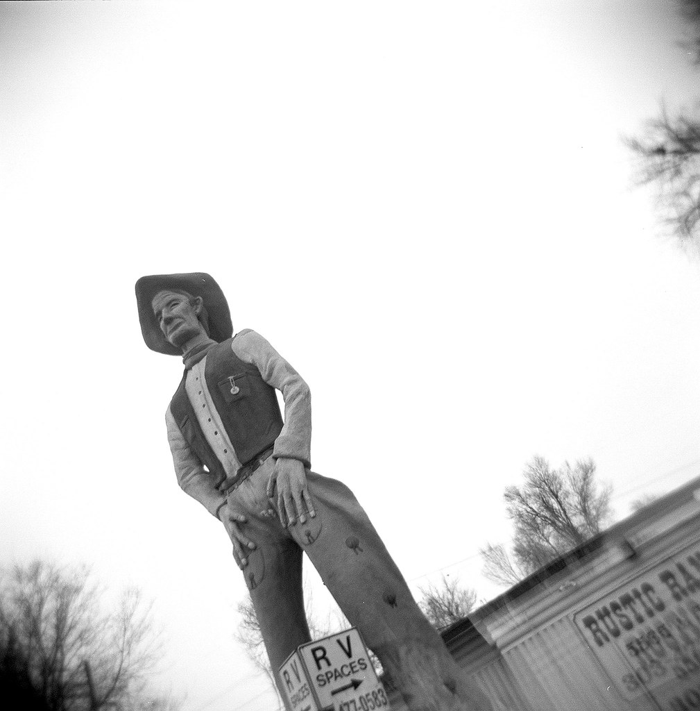 Concrete Cowboy This concrete cowboy has stood at the entr… Flickr