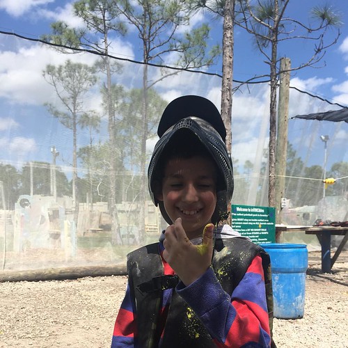 Kid gets shot and is ready for the next game!!!! paintbal… Flickr