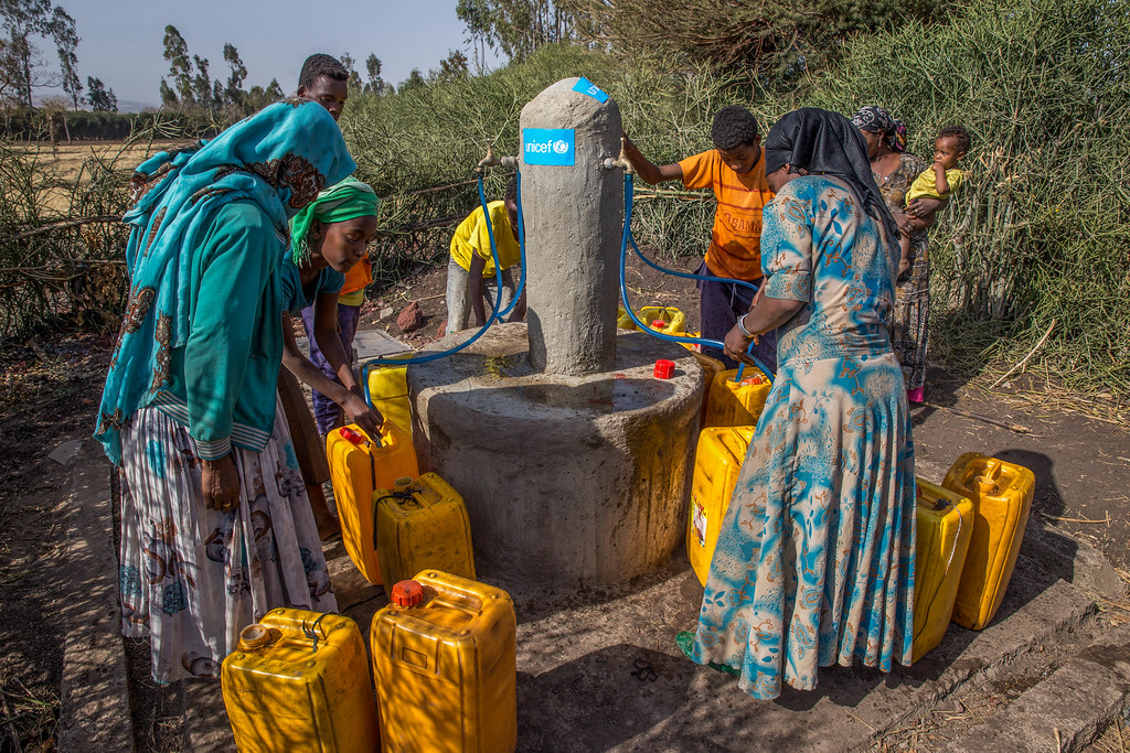 UNICEF Water Point Children say that the water pump is eve… Flickr